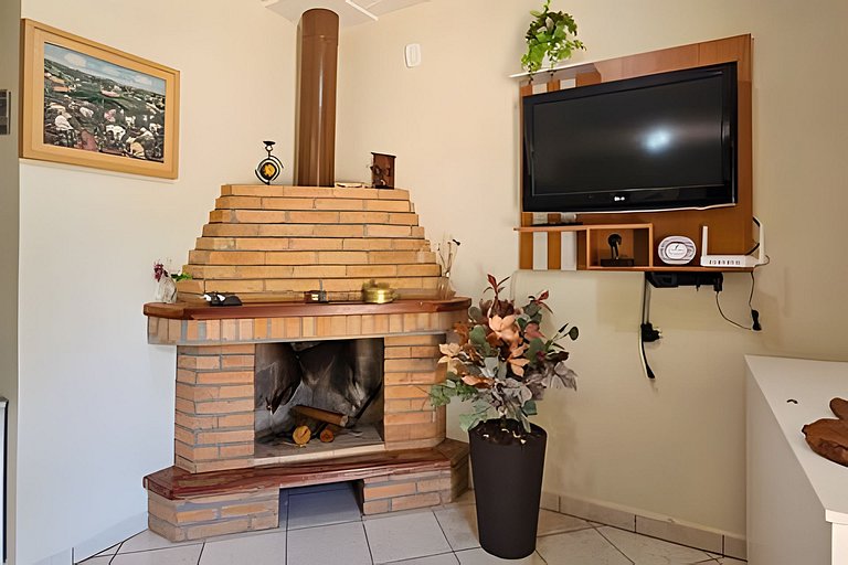 Charme de um típico chalé de campo com lareira.